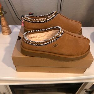 Brand new with box size 8, UGG, Tasman slip on